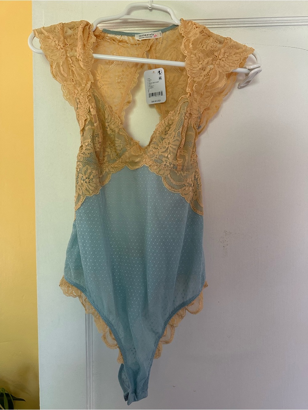 NWT Free People Blue and Peach Bodysuit